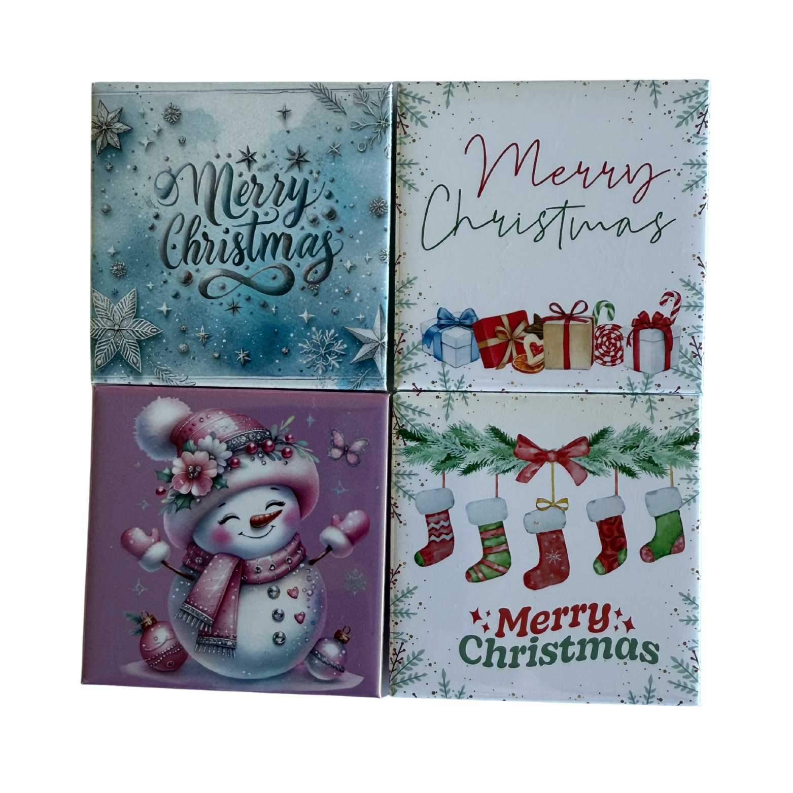 Four Christmas-themed greeting cards with different designs on a white background.