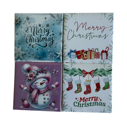 Four Christmas-themed greeting cards with different designs on a white background.