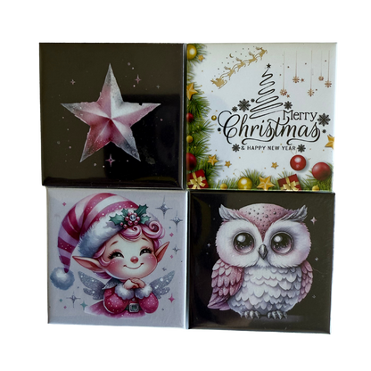 Four Christmas-themed boxes with star, fairy, owl, and tree designs.