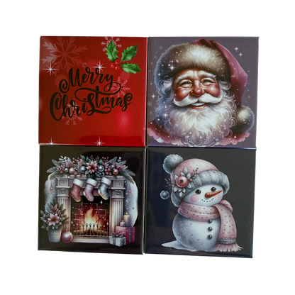 Four Christmas-themed greeting cards with Santa Claus, snowman, and fireplace designs.